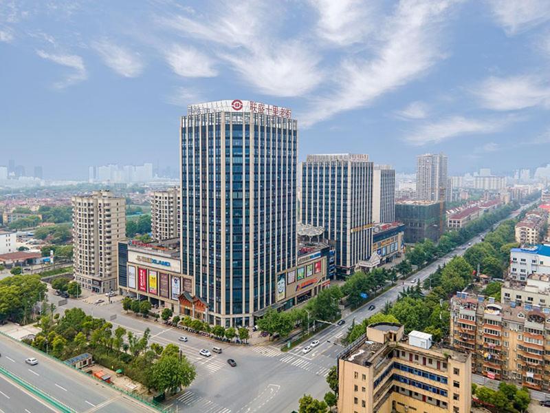 Vienna International Hotel Jiujiang Shili Street Exterior foto